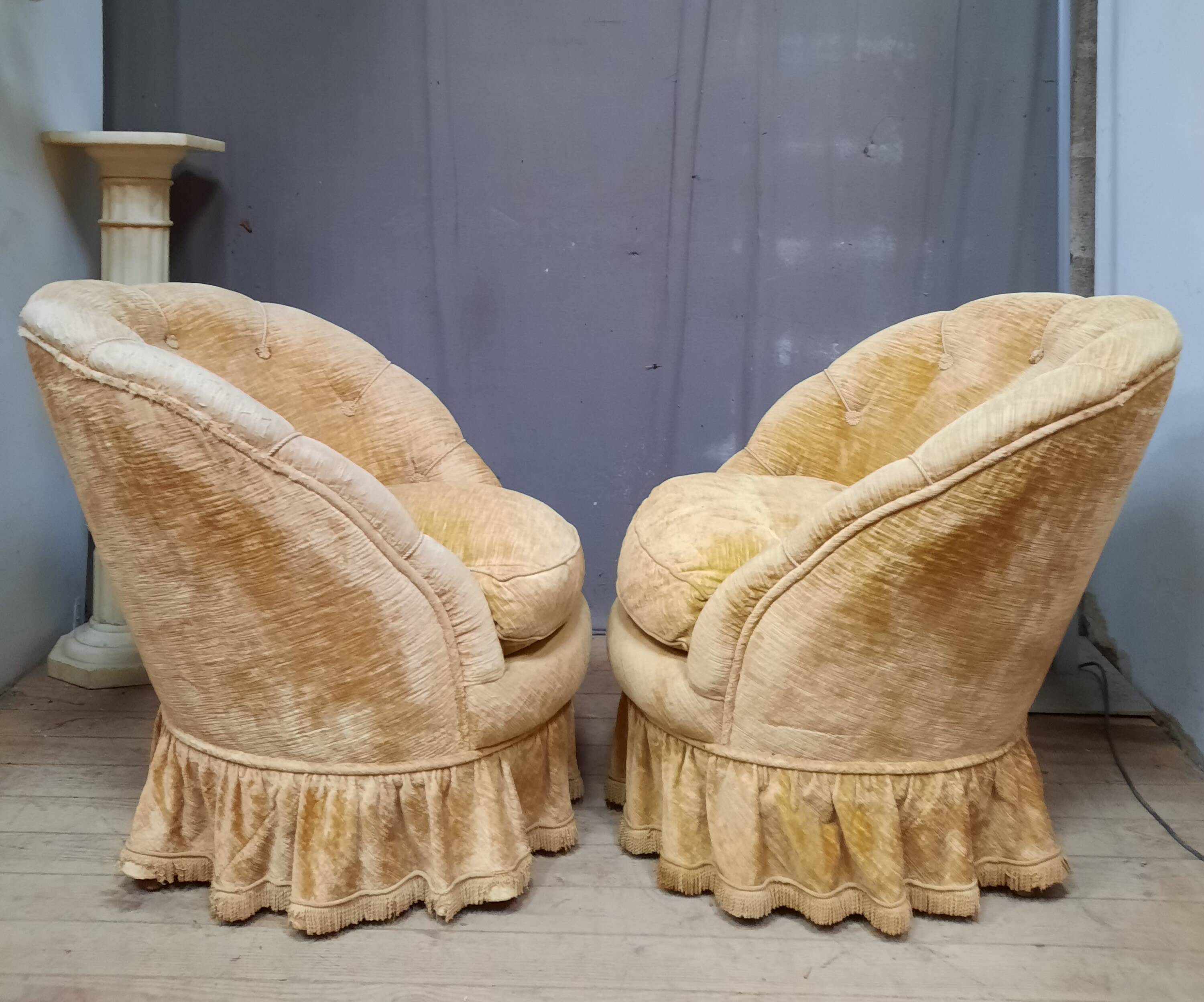 Pair of flared back toad armchairs