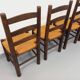 Set of 4 vintage brutalist chairs by Georges Robert in wood and straw.