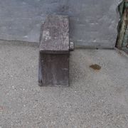 Low stool in vintage brown painted pine from the 1940s, with a rectangular seat.