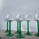 7 green glass stemmed glasses