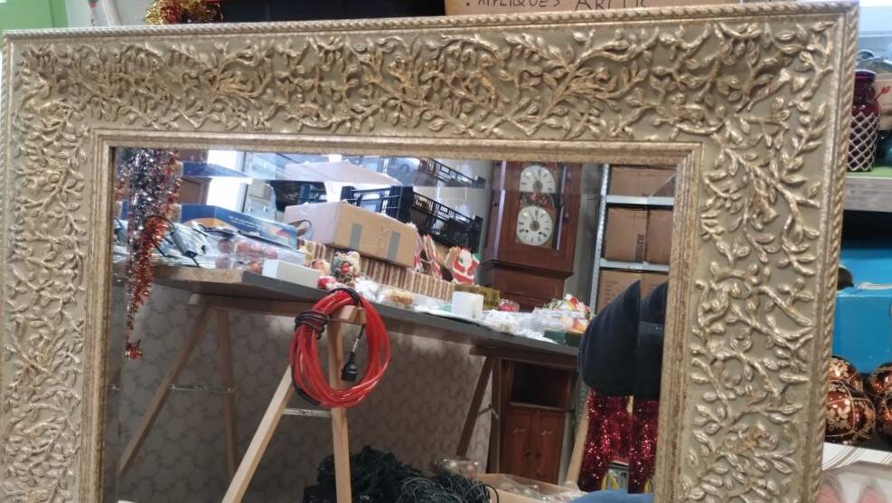 Rectangular mirror with its decorated frame