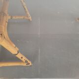1970s dining table with bamboo trestle legs and smoked glass