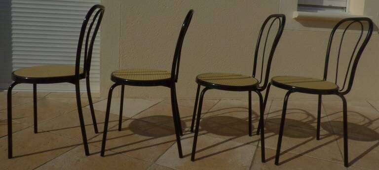 4 Black metal bistro chairs with plastic cane seat