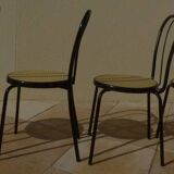 4 Chaises bistrot en métal noir et assise cannage plastique