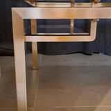 Table basse Guy Lefevre en laiton et verre