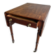 Antique drop-leaf side table on wheels
