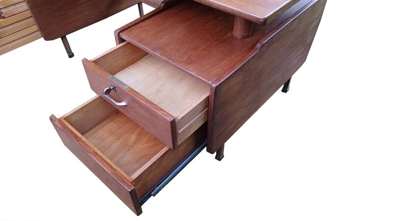 Vintage 1950s teak desk by designer Jacques Hauville.