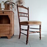Antique chair turned wood sitting velvet flowers