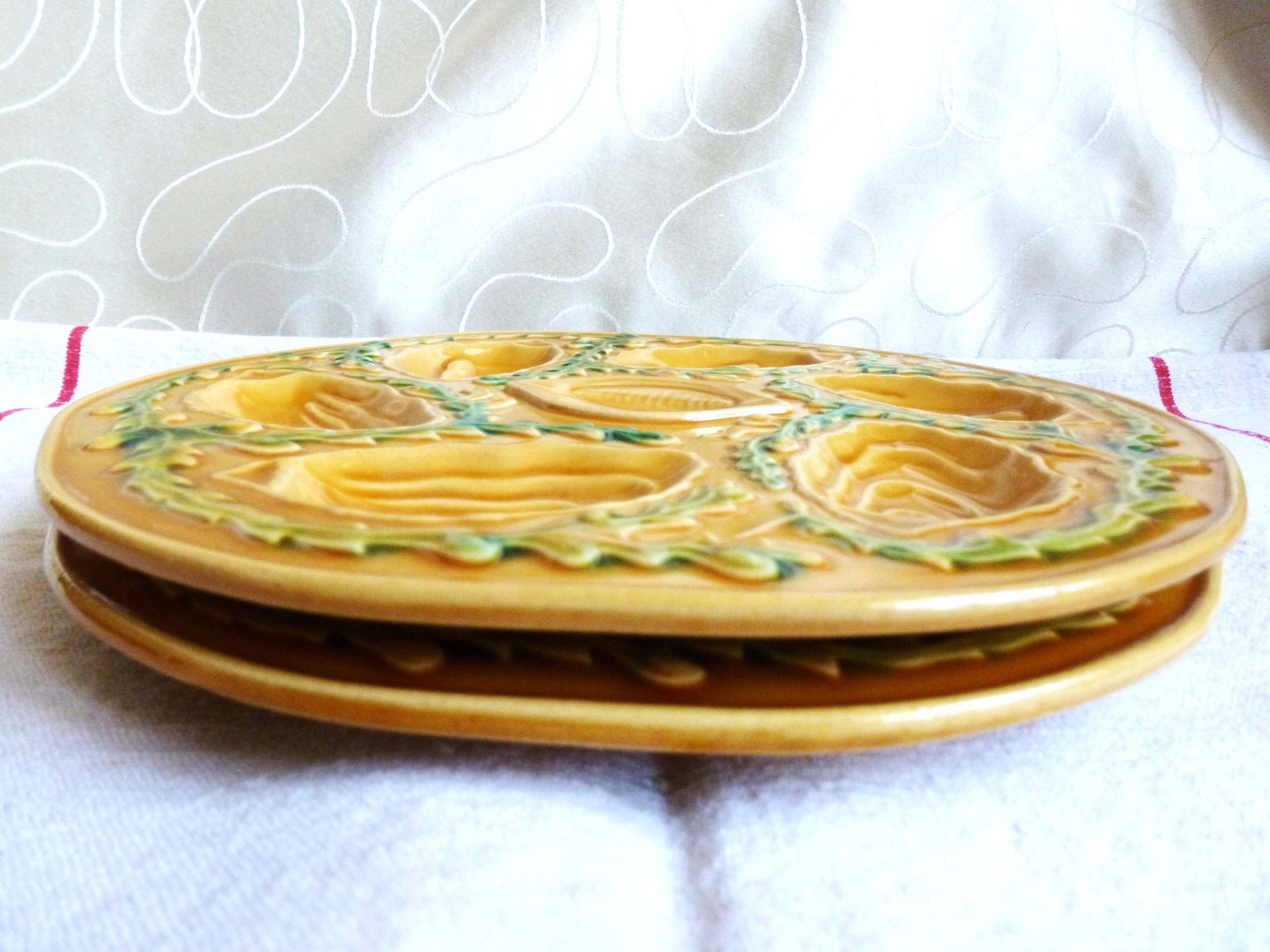 Oyster plates in slip, seafood plates, festive table.