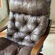 1970s Scandinavian armchair in curved laminated wood with a leather seat.