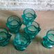 Six colourful glass pods