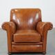 Cognac-colored antique sheep leather armchair