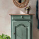 Small vintage side table in sage green patina and solid wood.