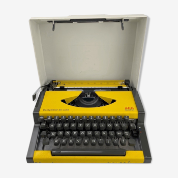 Machine à écrire dactymétal de luxe aeg olympia jaune