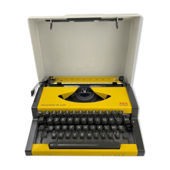 Machine à écrire dactymétal de luxe aeg olympia jaune