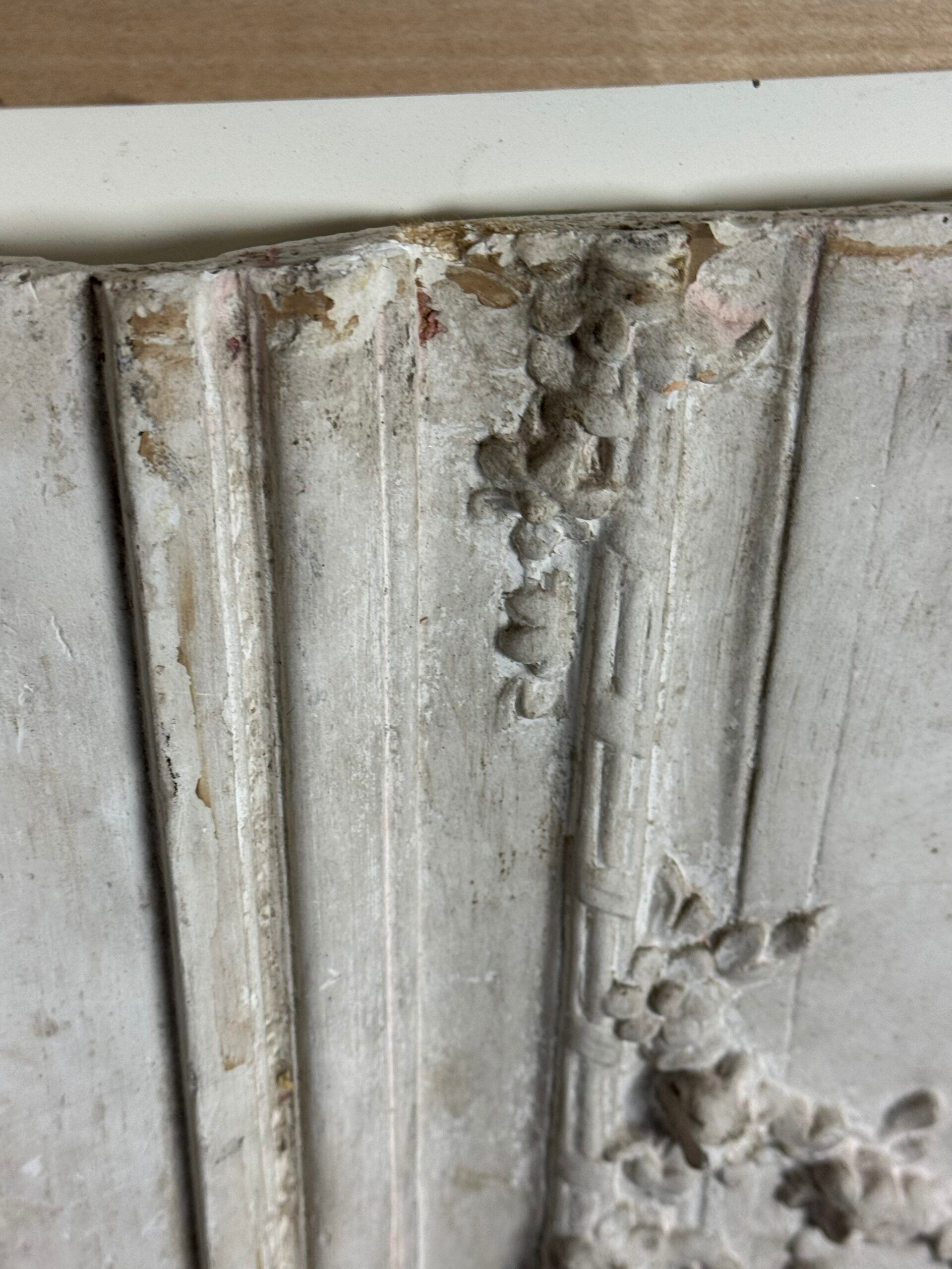 Plaster ceiling fragment framed