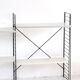 Tomado floor shelf in shades of gray