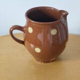 Stoneware pitcher.