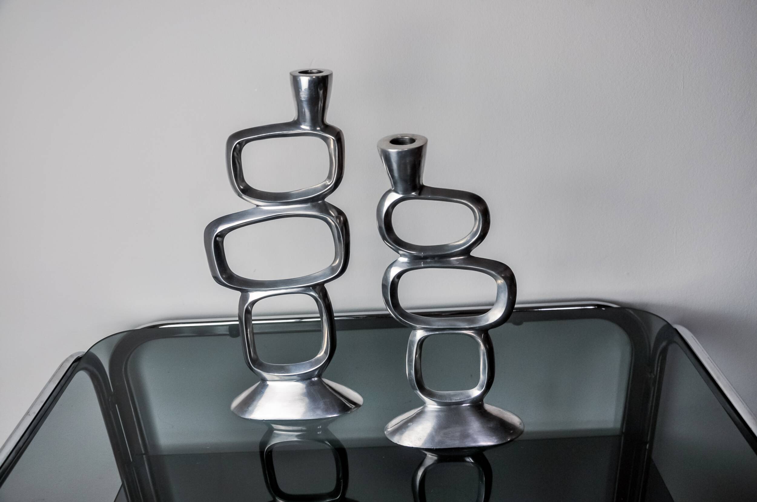Pair of circle candlesticks by Matthew Hilton, England, 1980