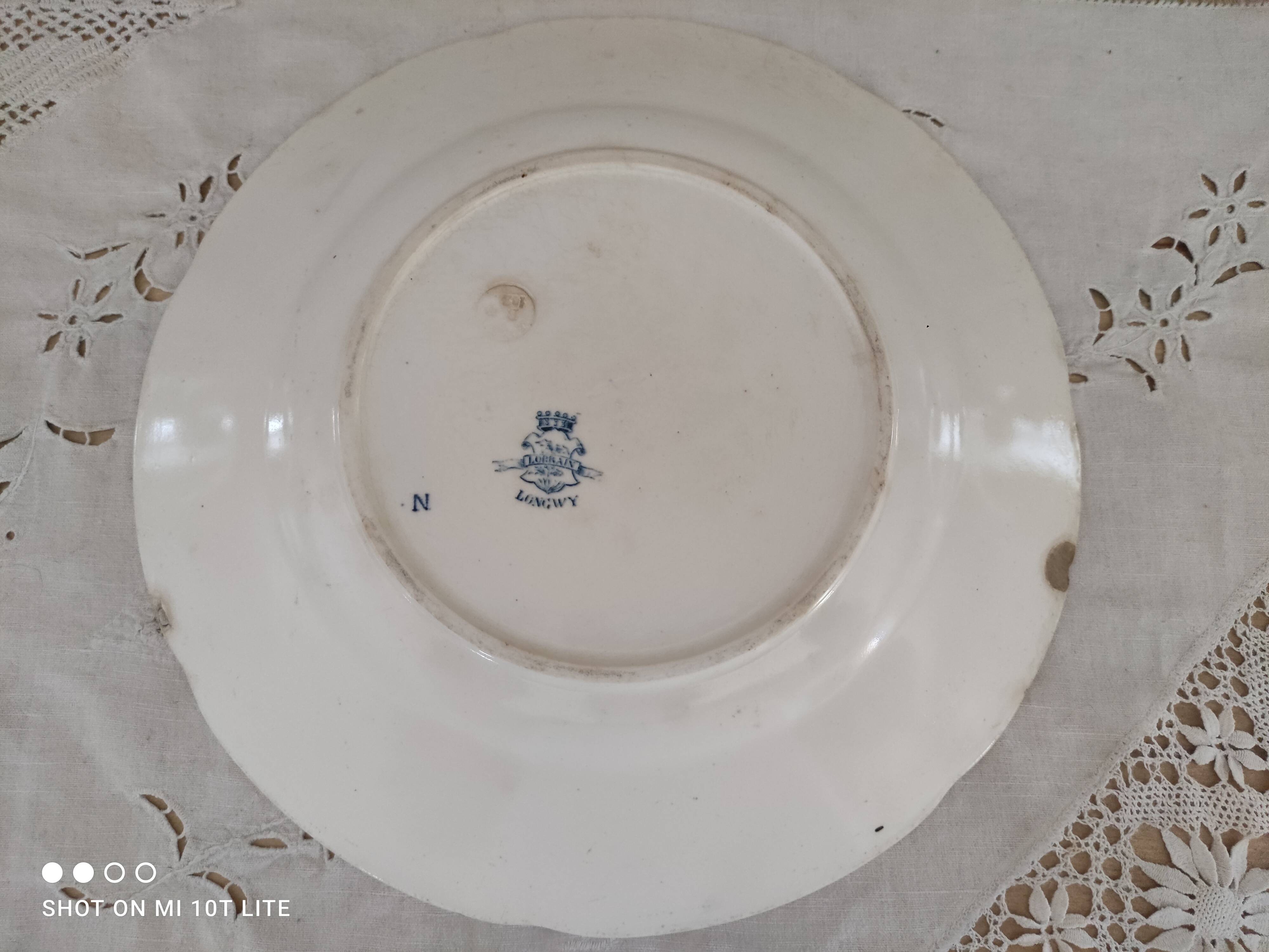 Round dish 2 in old earthenware from Longwy Lorrain model