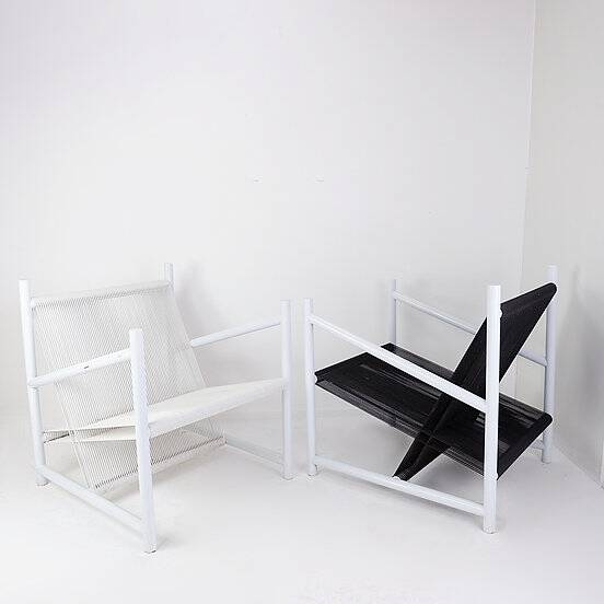 Indoor/Outdoor pair of Black/White Armchairs