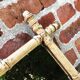 Old mirror in raw wood