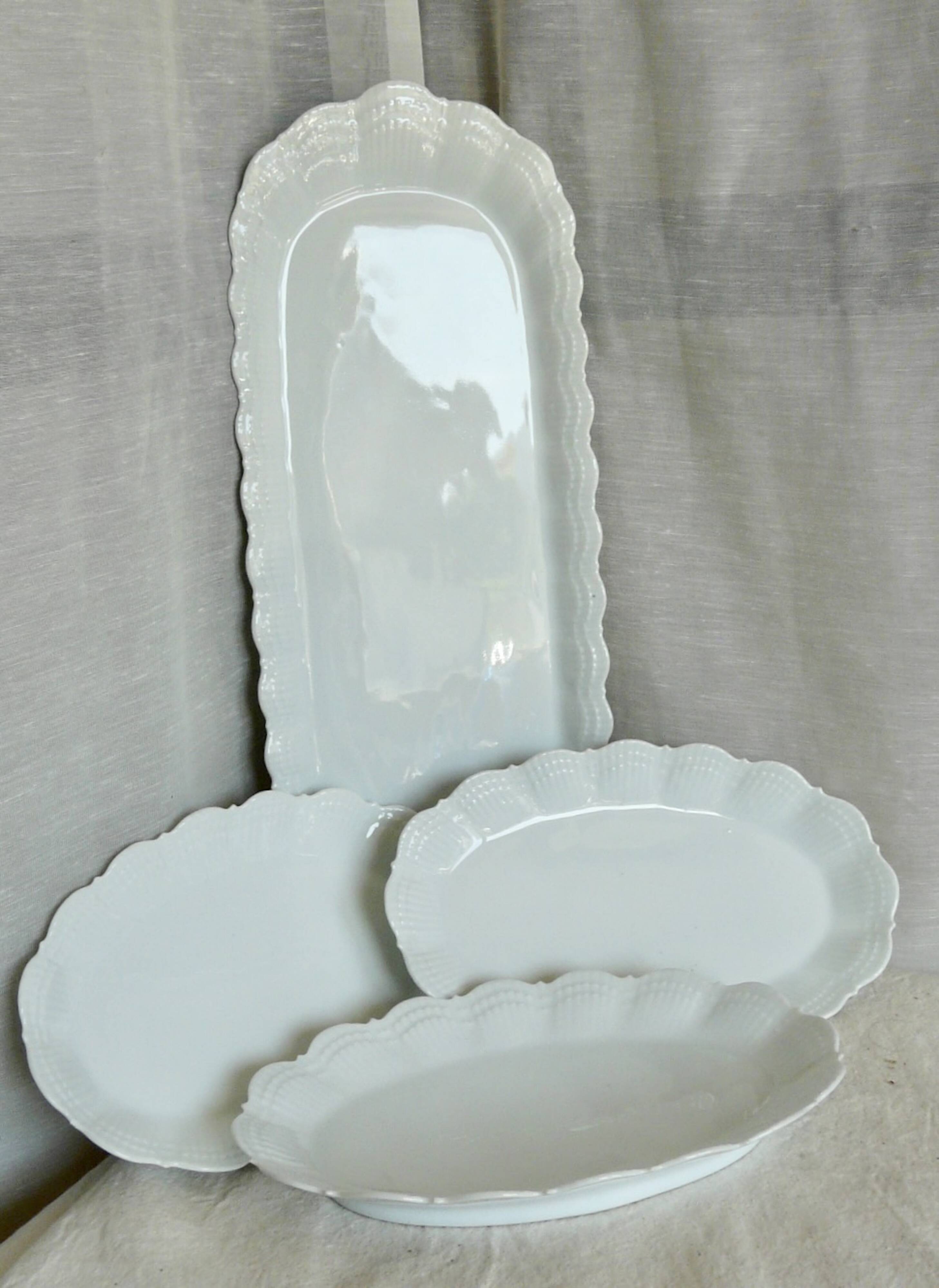 Service of 4 white porcelain dishes from Limoges Art Deco