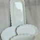 Service of 4 white porcelain dishes from Limoges Art Deco