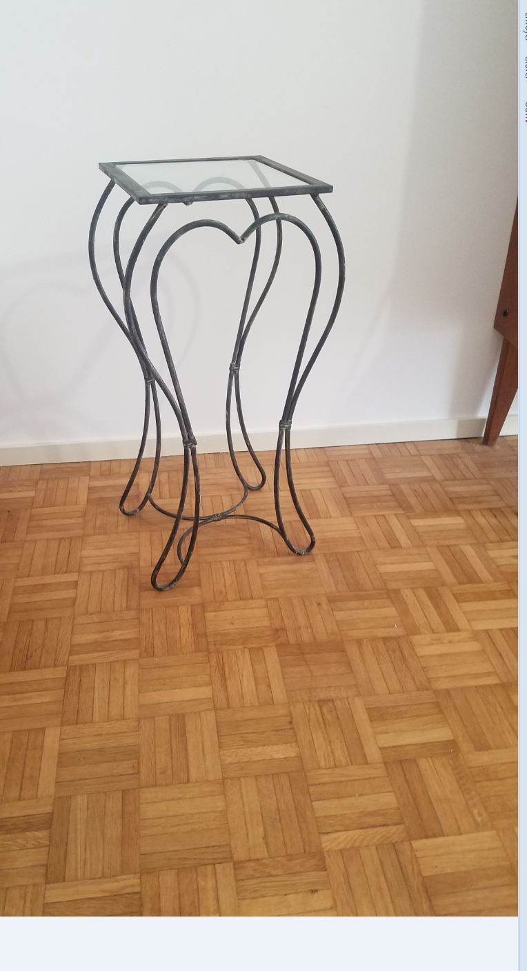 Wrought iron pedestal table