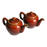 2 brown glazed ceramic teapots