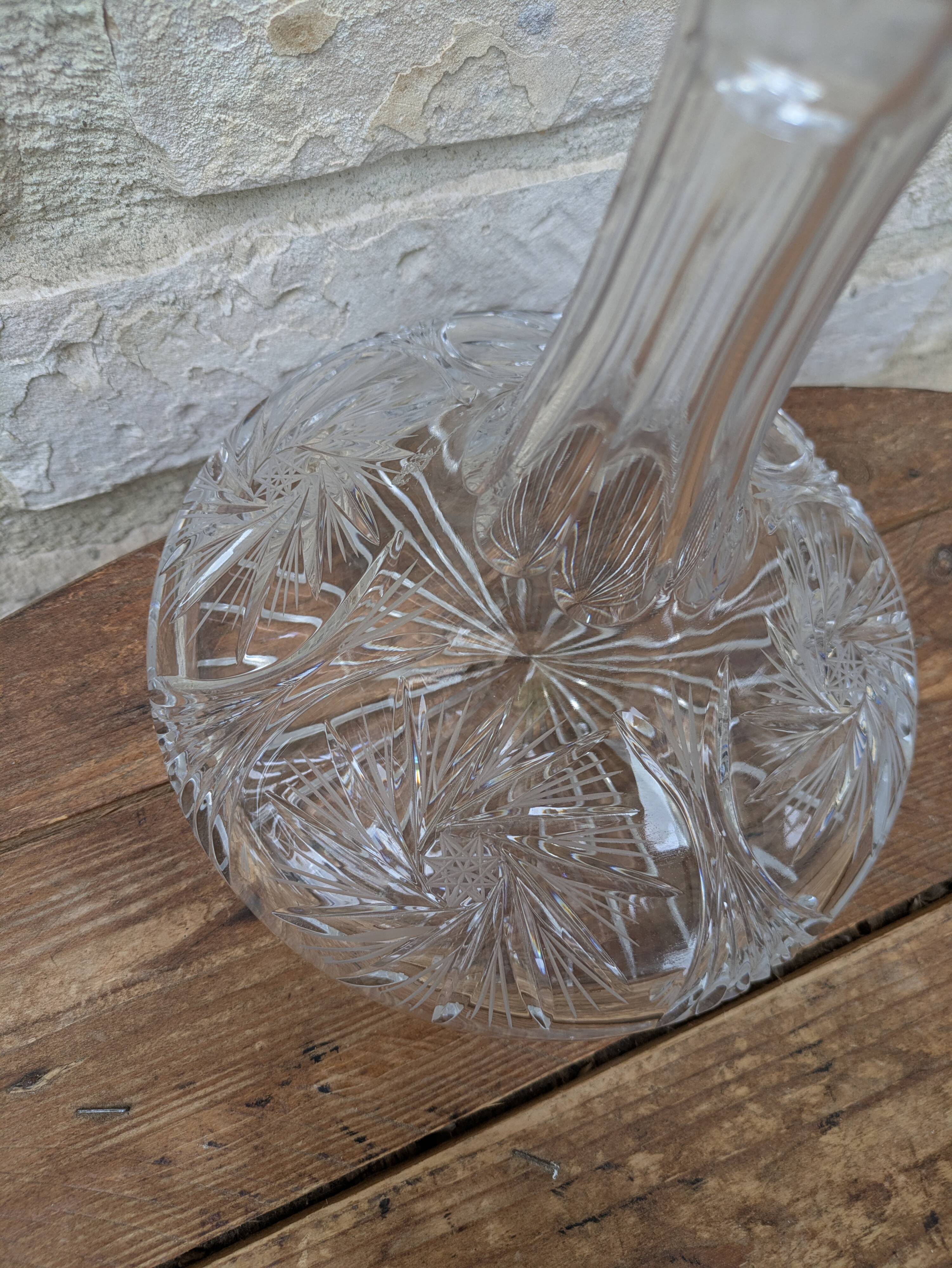 Antique cut crystal decanter with stopper.