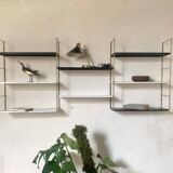 Vintage wall shelves in gold metal