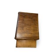 A vintage Italian chest of drawers, made of veneered walnut and solid wood,