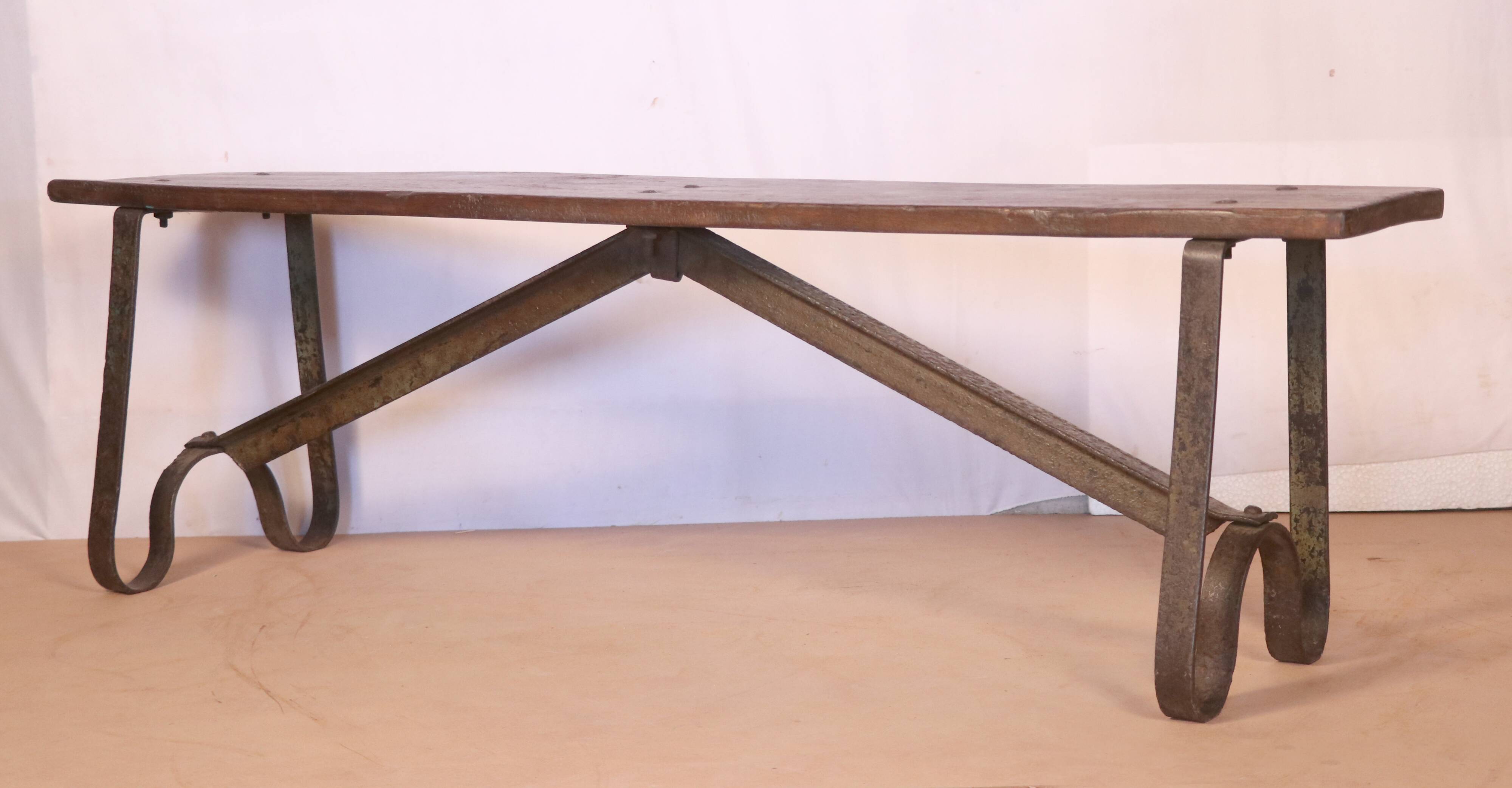 Old Burmese teak bench and wrought iron base