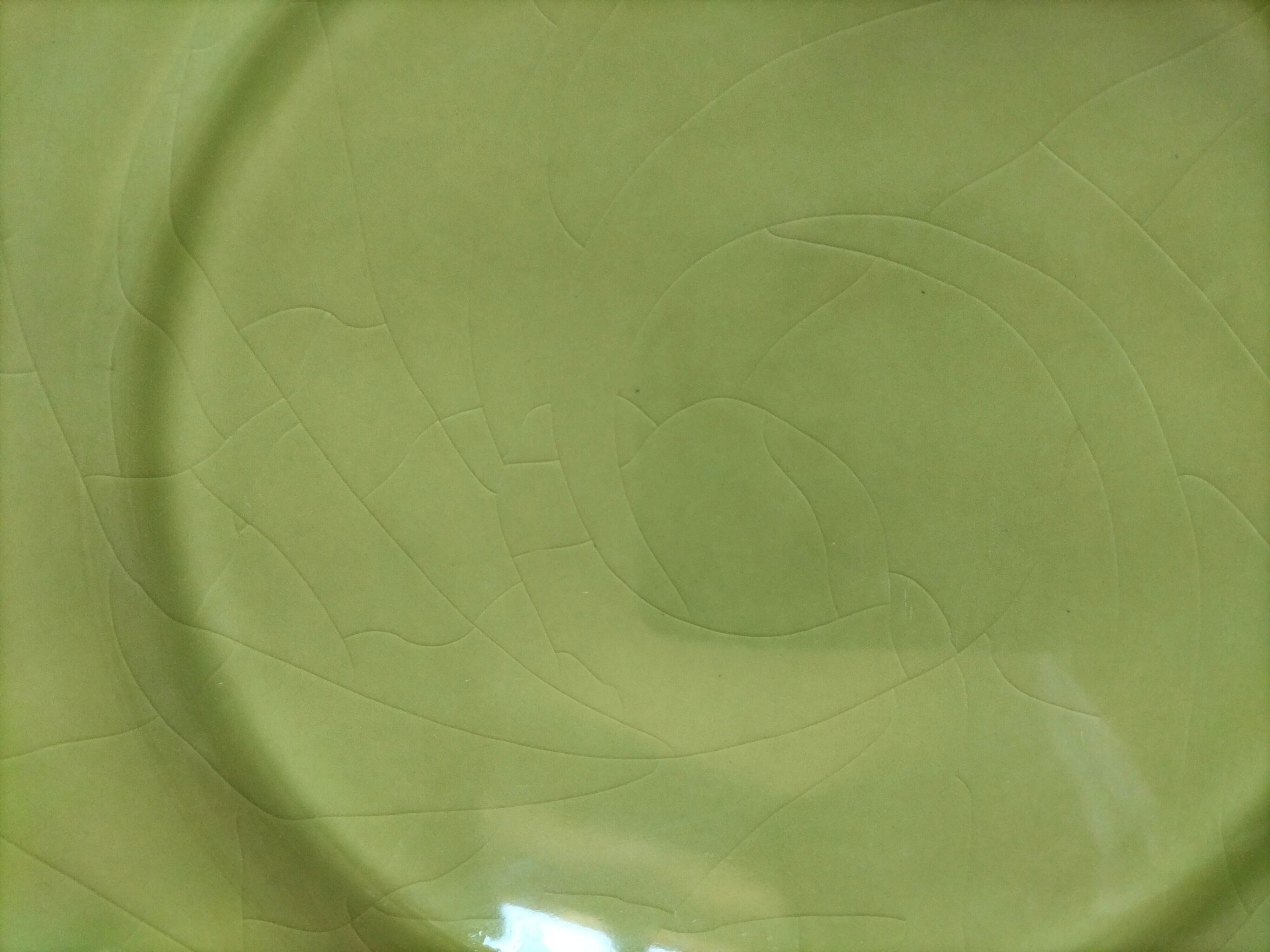 6 olive green plates with dotted relief, workshop ceramic style