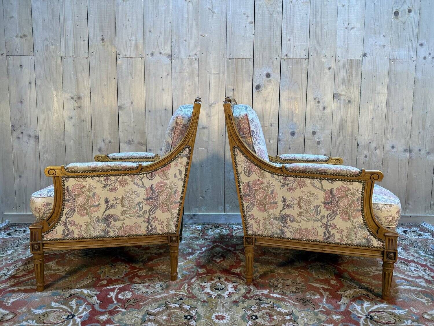 Pair of armchairs / bergères and footstool in Louis XVI style