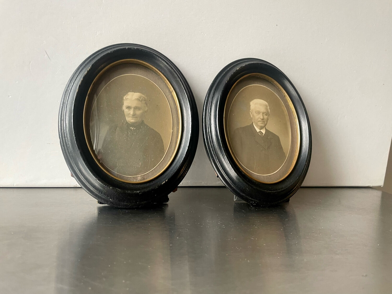 Antique pair of black wooden oval frames each 16.5 cm x 13 cm