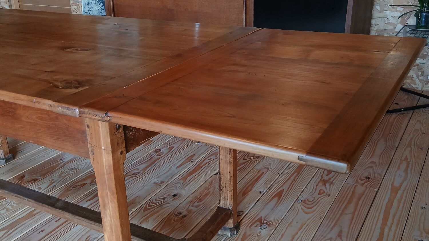 Elm farmhouse table with extensions for 6 to 10 people.