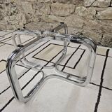 Round chrome coffee table with smoked glass