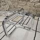 Round chrome coffee table with smoked glass