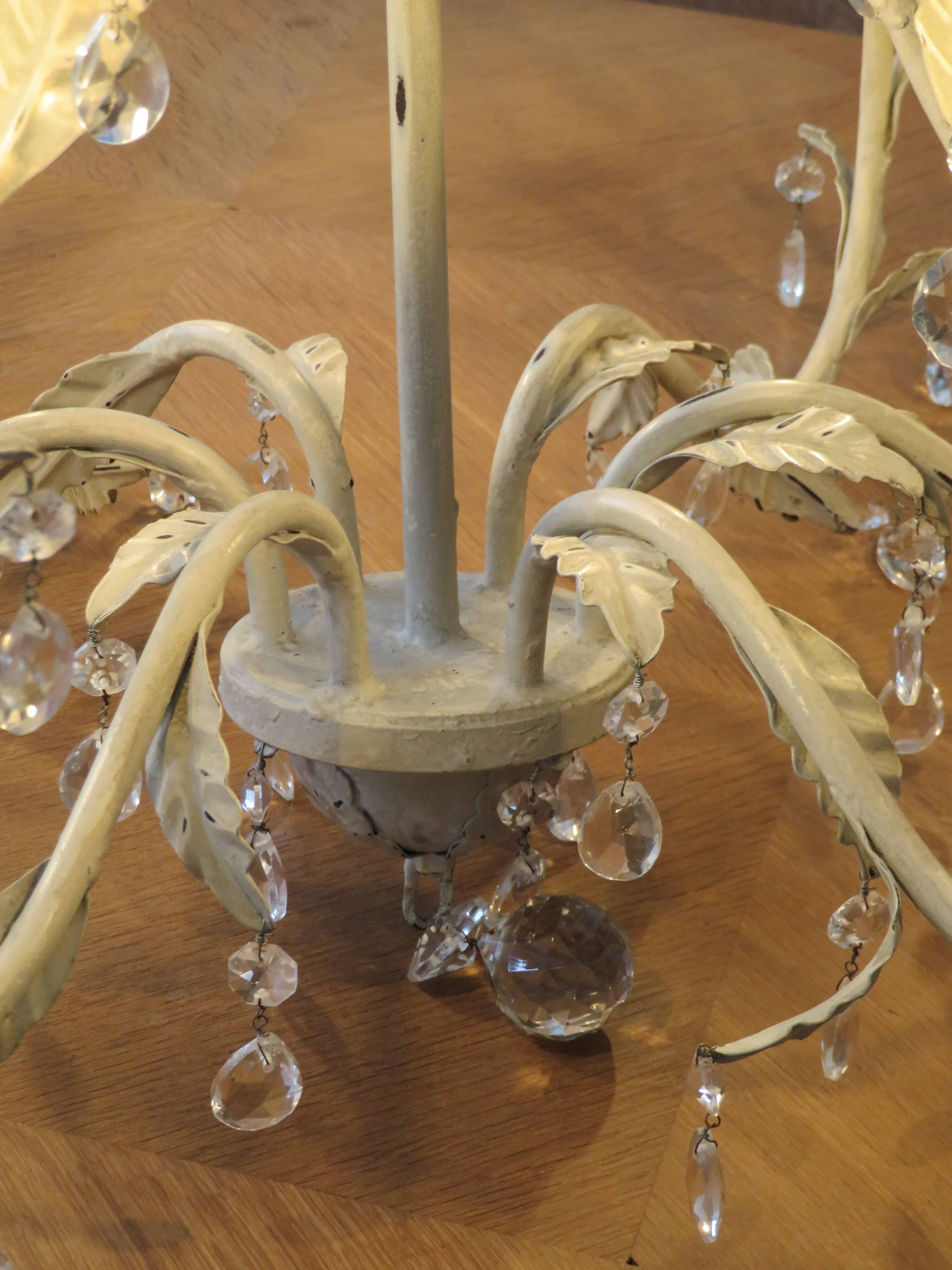 Large cage chandelier in aged metal.