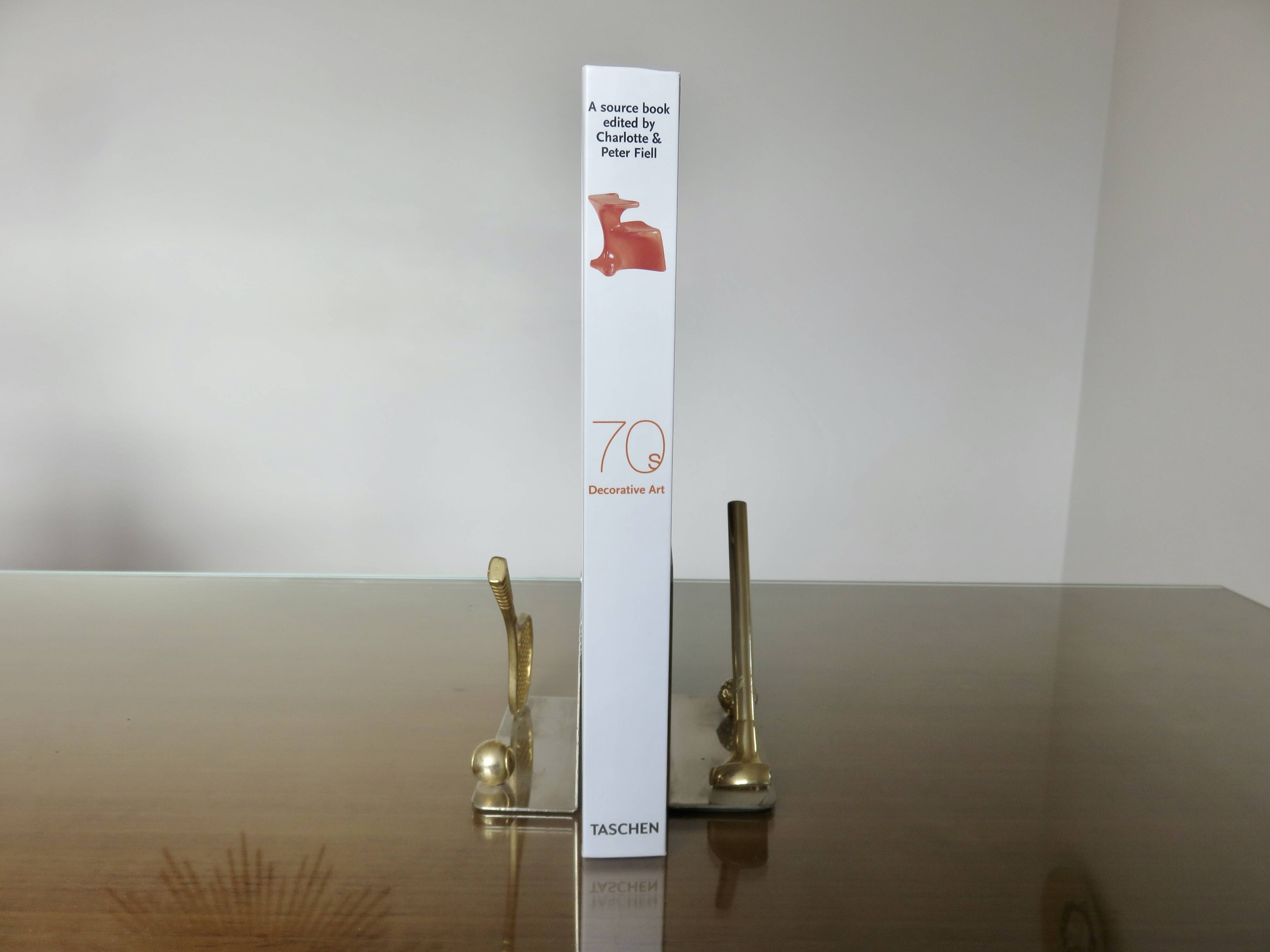 Serre livres en métal chromé et laiton "tennis & golf" années 70