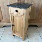 Furniture in raw wood and black marble