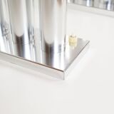 Pair of polished wall lamps by Gaetano Sciolari