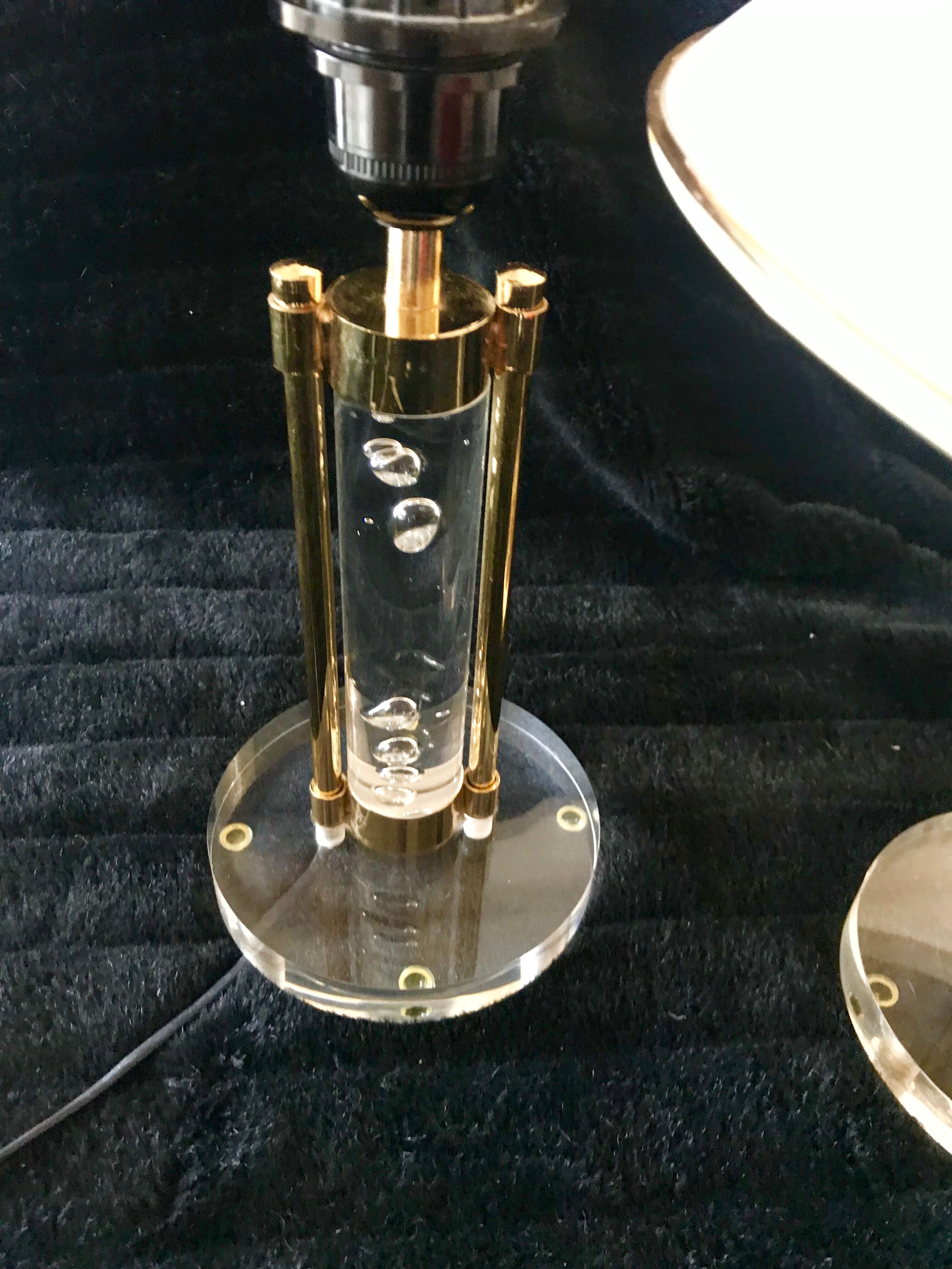 Pair of metacrilic lamps and gold structure