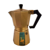 Italian coffee maker in golden alu