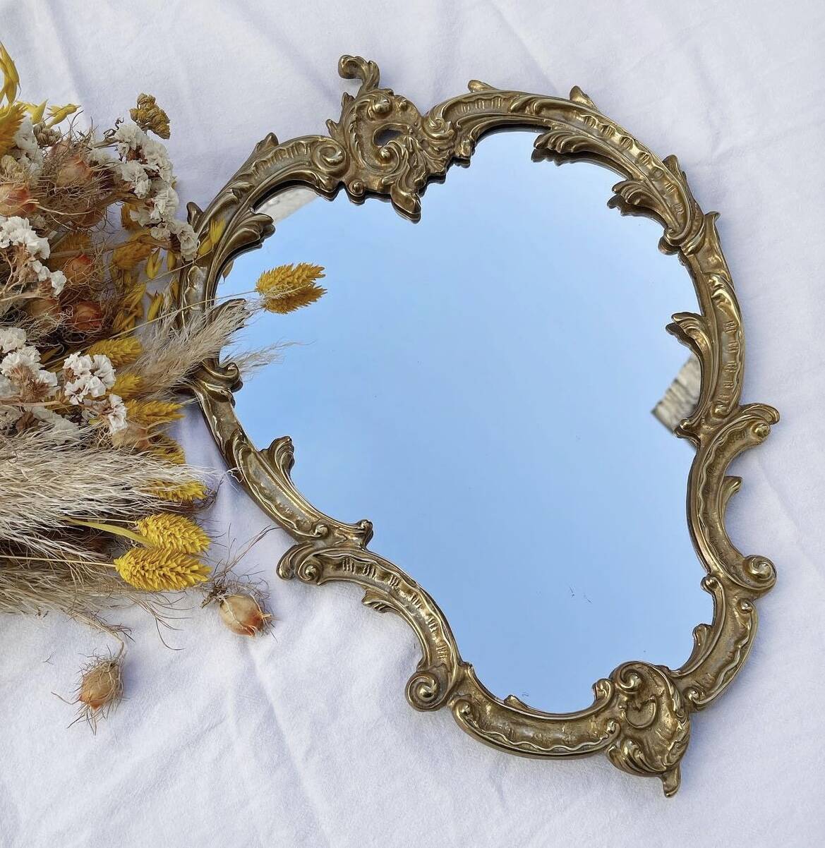 Golden brass mirror