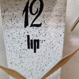 Lip wall clock