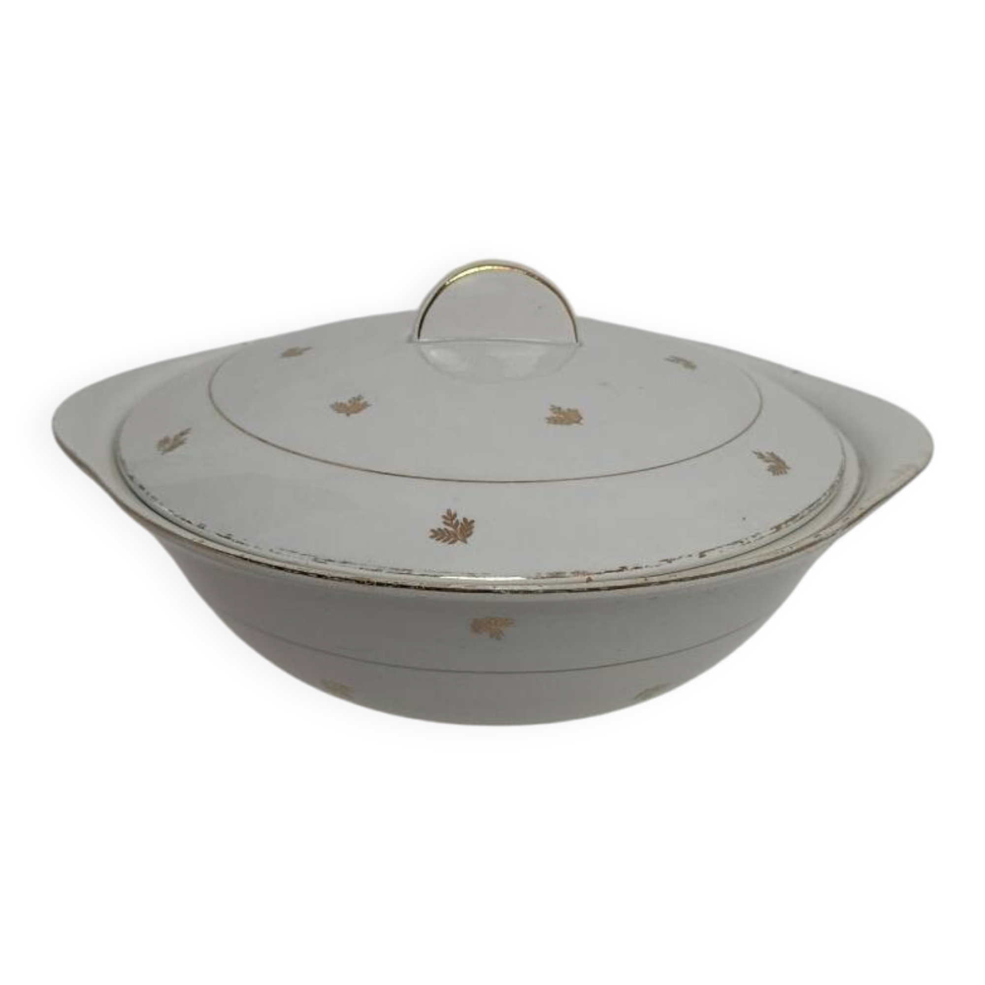 White earthenware soup tureen with a golden pattern.
