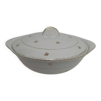 White earthenware soup tureen with a golden pattern.